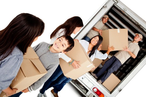 Removal van in Manvan loaded with boxes and furniture