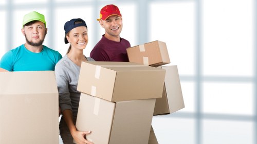 Professional movers preparing a removal van in Manvan